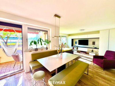 Familienfreundliche 4-Zimmer-Wohnung mit Tiefgaragenabstellplatz, Loggia, Gartenanlage &amp; nachhaltiger Heizung