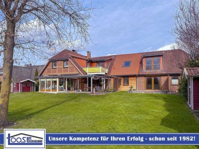 Zwei Wohneinheiten mit Gewerbeeinheit in Bad Schwartau, Langenfelde