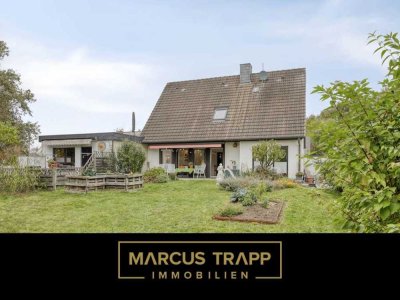 Clever investieren & selbst wohnen: Einfamilienhaus mit schöner Gartenwohnung in ruhiger Sackgasse