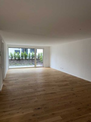 Neubau 2,5 -Zimmer-Gartengeschosswohnung mit Terrasse - Erstbezug!