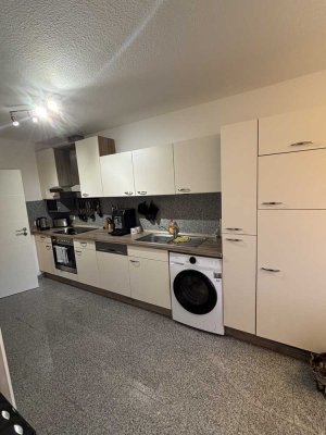 Moderne 3-Zimmer-Erdgeschosswohnung mit Balkon und Gartenmitbenutzung