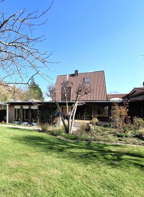 Stilvolles Einfamilienhaus mit großzügigem Anbau im Bungalow-Stil