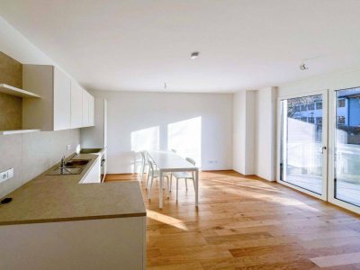"SEENSWERT" Neubau-Erstbezug: Teilmöblierte 2-Zimmer Mietwohnung mit Balkon und TG-Platz