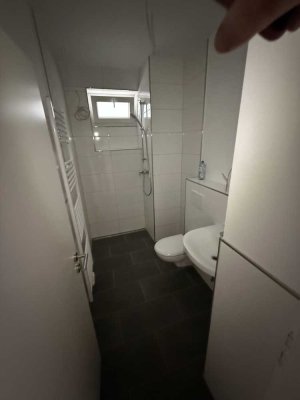 Modernisierte 2,5 Zimmer EG Wohnung mit kleinem Garten