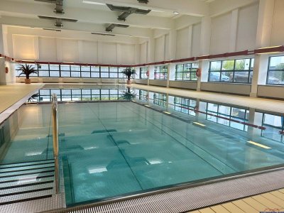 Gartenwohnung mit unverbaubarem Waldblick - inklusive Nutzung von Hallenbad, Sauna, Turnsaal