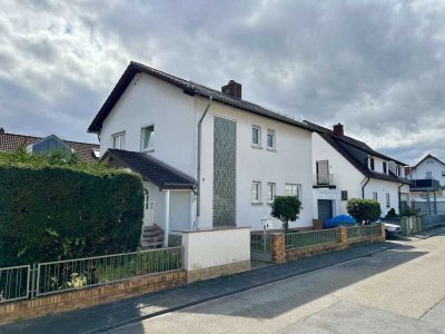 Familienfreundliches Einfamilienhaus mit Südbalkon, Terrasse und Garten!
