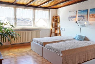 Charmante 3-Zimmer-Dachwohnung mit Gartenanteil und Weitblick