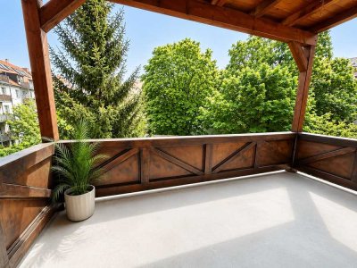 Geräumige 2 Zimmer Wohnung mit Kamin, Balkon und Einbauküche in bester Lage!
