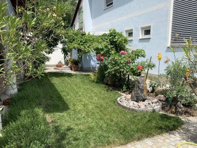 Gepflegtes Einfamilienhaus mit entzückenden Garten zu verkaufen