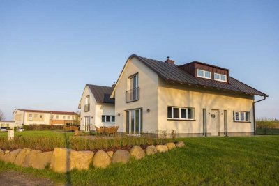 Ferienhaus mit Betreibergesellschaft in direkter Wasserlage