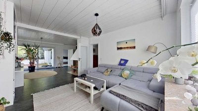 Exklusives Wohnen im Erdgeschoss: Moderne 3-Zimmer-Wohnung mit Terrasse und Kamin
