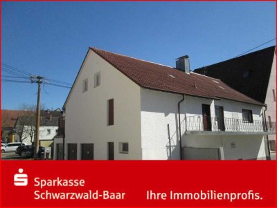 Doppelhaushälfte mit 4 Garagen