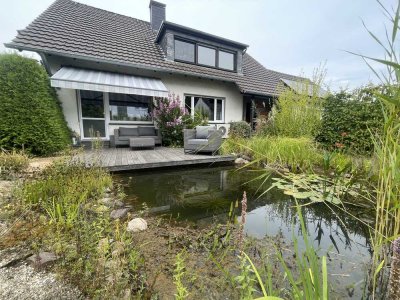 Repräsentatives Ein- bis Zweifamilienhaus mit Garage und zusätzlich erwerbbarem Baugrundstück