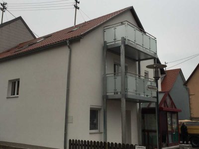 Modernisiertes Wohnhaus mit ausgebautem Dachgeschoss und umgewandelter Ladenfläche umfassend saniert