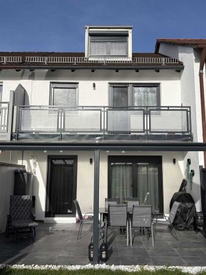 Reihenmittelhaus mit Garten in München / Aubing