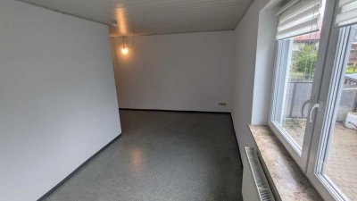 Freundliche 1,5-Zimmer-EG-Wohnung mit Balkon und Einbauküche in Sand am Main