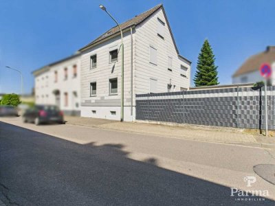 Solides Einfamilienhaus mit Halle zur gewerblichen Nutzung in Kreuzau