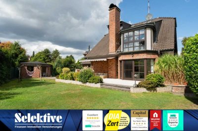 Exklusive 175m² Maisonette-Wohnung im EG und Souterrain mit luxuriösem Wohnkomfort und großem Garten