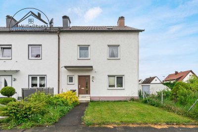 REIHENENDHAUS MIT POTENZIAL IN EINEM FAMILIENFREUNDLICHEN WOHNGEBIET MIT GARTEN UND ZWEI EINZELGARAG