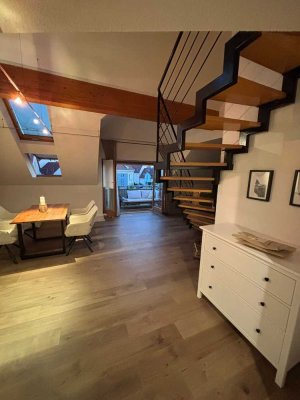 Außergewöhnlich geschnittene 3,5 Zimmer  Maisonettewohnung mit Balkon, Einbauküche und Duplexgarage