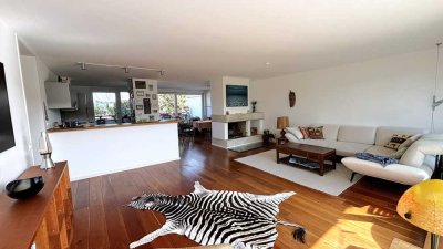 Lichtdurchflutetes Penthouse mit drei Dachterrassen in München-Harlaching
