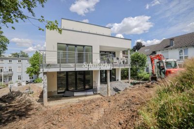 Neubauwohnung! Barrierefreie helle Wohnung, Aufzug, Citynah, Carport und ruhiger sonniger Balkon