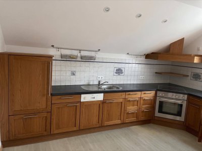 Dachgeschosswohnung in sonniger ruhiger Lage
