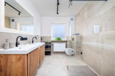 Sofort bezugsfertige, sanierte Wohnung mit Westbalkon und zwei Tiefgaragenstellplätzen