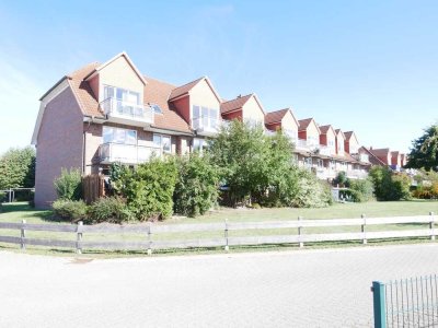 Behagliche Zweiraumwohnung mit Balkon, Stellplatz und Einbauküche!