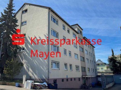 Vermietete 2-Zimmer-Erdgeschosswohnung mit Balkon und optional 2 Garagen