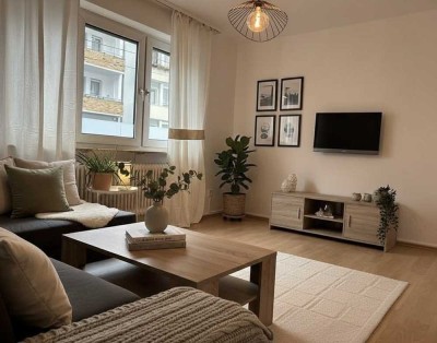 Urbanes Leben trifft Ruhepol: Design-Apartment direkt am Luisenplatz