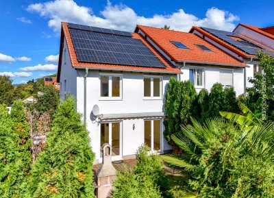 Erbbau: Modernes Reihenhaus in familienfreundlicher Umgebung