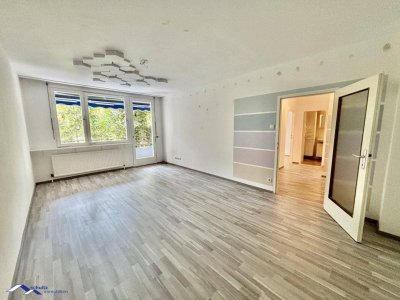 SCHULTZ IMMOBILIEN - Charmante 2-Zimmer-Wohnung in Baden! Ruhelage! Balkon und Garage!