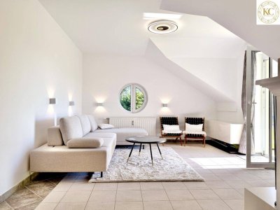 Stylisches Design-Apartment mit Balkon und Wörthersee-Blick – Wohnen, wo andere Urlaub machen
