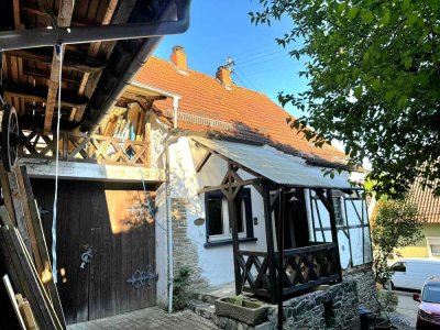 Freistehendes Einfamilienhaus mit Scheunen zu verkaufen