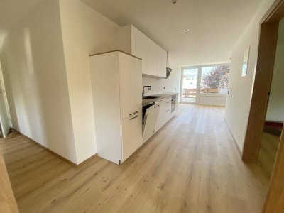 Sonnige 3-Zi-Whg mit Balkon, Garten und 2 Parkplätzen - Erstbezug nach Kernsanierung