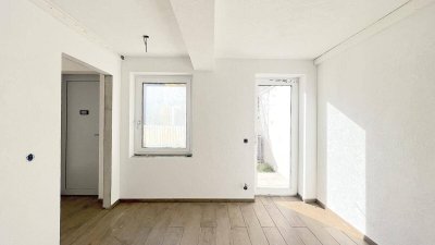 Moderne Neubau-3-Zimmer-Wohnung mit Garten und Carport inkl. PV-Anlage!