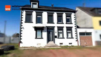 Modernisiertes Eigenheim in Naßweiler – Mit 2 Garagen & Gartenanteil!