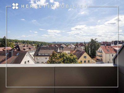 Erstbezug: Loftartige 2,5-Zimmer-Wohnung mit Einbauküche, Balkon & Traumblick