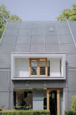 Designperle mit puristischer Fassade im grünen Bismarkviertel