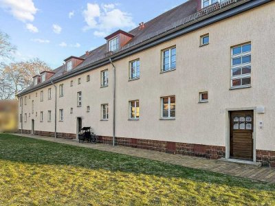 Familientraum in den Französischen Gärten - Leipzig: 4-Zimmer-Wohnung mit zwei Balkonen und Garten