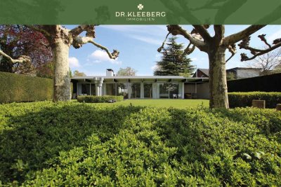 Puristische Eleganz trifft Natur – Mid Century Bungalow in Münster-Mauritz