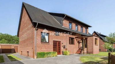 Attraktives Mehrfamilienhaus mit 2 Wohneinheiten, großem Grundstück, Garage und Werkstatt