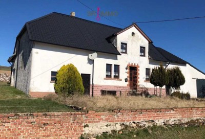 Gemütliches Häuschen mit Garten auf großem Grundstück