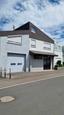 Solides Mehrfamilienhaus mit Gewerbefläche in guter Wohnlage von Pohlheim