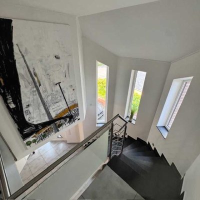 Exklusive Doppelhaushälfte als Einfamilienhaus mit Garage und Traumgarten