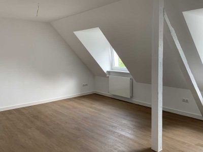 Schicke 2-Zimmer-Dachgeschosswohnung mit Einbauküche zentral in Unna