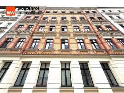 Denkmalgerecht sanierte 2-Zimmer-Wohnung mit Balkon und historischem Charme