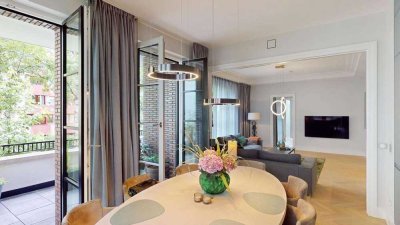 Architektonisches Meisterstück in Bestlage - Stadtwohnung mit Sauna und Ruheoase mit Gartenblick