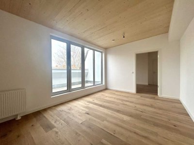 Traumhafte Dachgeschosswohnung mit Einbauküche im Erstbezug